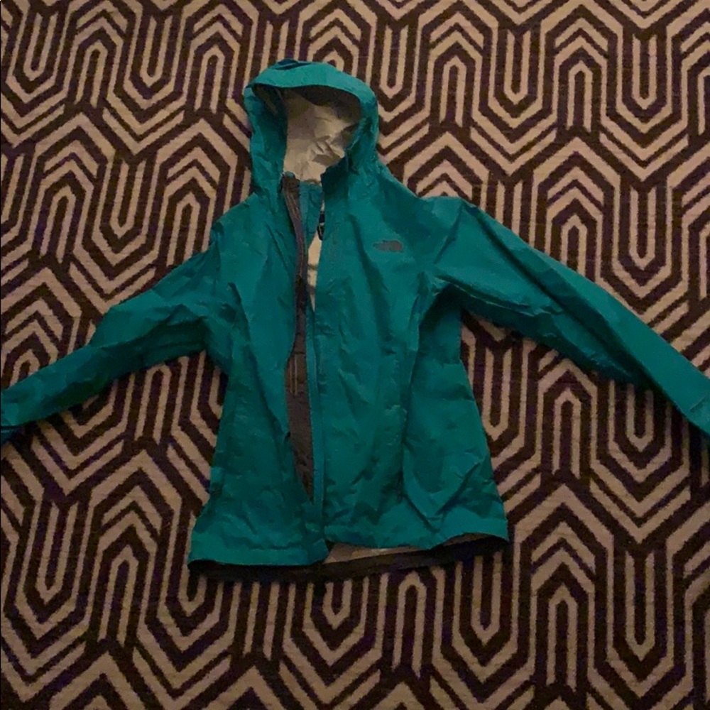 North face teal raincoat !